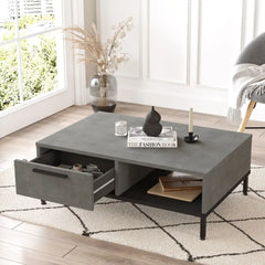 Table basse CALLISTO ouverte montrant le tiroir de rangement et niche ouverte.