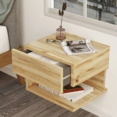 Table de chevet suspendue en bois clair avec tiroir ouvert – Design moderne et minimaliste pour chambre adulte ou enfant.